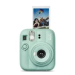 Appareil photo instantané Fujifilm Instax Mini 13 - Alimentation par deux piles alcalines AA - Éjection de film automatique - Vert lagune